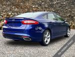 2016 Ford Fusion SE - Blue exterior view 2