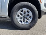 2026 Nissan Frontier S — Glacier White interior and detail view 9, for sale at Bellingham Nissan in Bellingham, WA