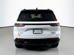 2023 Jeep Grand Cherokee Trailhawk 4xe — Bright White Clearcoat exterior view 6, for sale at Legend  Auto Sales in Puyallup, WA