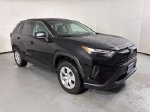 2025 Toyota RAV4 LE — Midnight Black Metallic exterior view 2, for sale at Courtesy Volvo Cars of Scottsdale in Scottsdale, AZ
