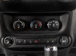 2015 Jeep Wrangler Unlimited Freedom Edition — Red interior and detail view 18, for sale at RDS Ineos Grenadier in Devon, PA