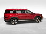 2027 Hyundai Santa Fe Limited — Red exterior view 3, for sale at McGrath Ford in Hiawatha, IA