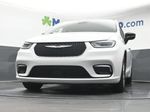 2024 Chrysler Pacifica Touring L — Bright White Clearcoat exterior view 7, for sale at McGrath Ford in Hiawatha, IA
