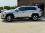 2023 Toyota RAV4 Hybrid XLE — Silver Sky Metallic exterior view 4, for sale at Velocity Auto Source in RICHMOND, KY