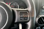2011 Jeep Wrangler Sport — Bright Silver Metallic interior and detail view 11, for sale at Lakeside Automotive Group in Spring Lake, MI