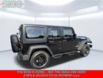 2016 Jeep Wrangler Unlimited Sport — Black Clearcoat exterior view 7, for sale at Shift Innovations Car Co in Puyallup, WA