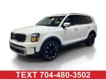 2024 Kia Telluride SX-Prestige - White Pearl exterior view 1