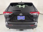 2025 Toyota RAV4 LE — Midnight Black Metallic exterior view 7, for sale at Courtesy Volvo Cars of Scottsdale in Scottsdale, AZ