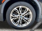 2019 BMW X2 sDrive28i — Black Sapphire Metallic interior and detail view 9, for sale at A Better Way Wholesale Autos in Naugatuck, CT