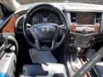 2017 Nissan Armada Platinum — Pearl White exterior view 5, for sale at A Better Way Wholesale Autos in Naugatuck, CT