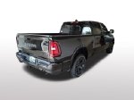 2026 Ram 1500 Big Horn/Lone Star — Diamond Black exterior view 6, for sale at Ryan CDJR Buffalo in Buffalo, MN
