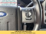 2014 Ford F-250SD Lariat — White Platinum Clearcoat Metallic interior and detail view 14, for sale at Shift Innovations Car Co in Puyallup, WA