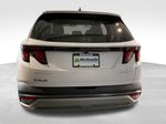 2026 Hyundai Tucson Hybrid SEL — White Pearl exterior view 6, for sale at McGrath Ford in Hiawatha, IA