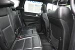 2018 Jeep Grand Cherokee Limited — Bright White Clearcoat interior and detail view 10, for sale at McGrath Ford in Hiawatha, IA