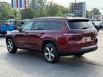 2021 Jeep GRAND CHEROKEE L Limited — Velvet Red Pearlcoat exterior view 4, for sale at Autostar CDJR of Hendersonville in Hendersonville, NC