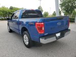 2023 Ford F-150 XLT — Blue Metallic exterior view 3, for sale at Downtown Nashville Nissan in Nashville, TN