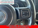 2016 Jeep Wrangler Unlimited Sport — Black Clearcoat interior and detail view 14, for sale at Shift Innovations Car Co in Puyallup, WA