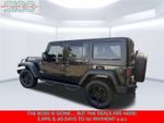 2016 Jeep Wrangler Unlimited Sport — Black Clearcoat exterior view 4, for sale at Shift Innovations Car Co in Puyallup, WA