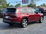 2021 Jeep GRAND CHEROKEE L Limited — Velvet Red Pearlcoat exterior view 3, for sale at Autostar CDJR of Hendersonville in Hendersonville, NC
