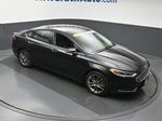 2020 Ford Fusion SEL — Black Metallic exterior view 3, for sale at McGrath Ford in Hiawatha, IA