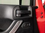 2015 Jeep Wrangler Unlimited Freedom Edition — Red interior and detail view 11, for sale at RDS Ineos Grenadier in Devon, PA