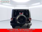 2016 Jeep Wrangler Unlimited Sport — Black Clearcoat exterior view 6, for sale at Shift Innovations Car Co in Puyallup, WA