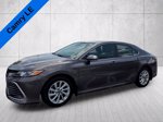 2024 Toyota Camry LE — Predawn Gray Mica primary exterior view, for sale at WALKER ACURA | DrivewithRJ in Metairie, LA