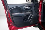 2015 Jeep Cherokee Trailhawk — Deep Cherry Red Crystal Pearlcoat interior and detail view 20, for sale at Lakeside Automotive Group in Spring Lake, MI
