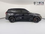 2026 BMW X5 xDrive40i — Black Sapphire Metallic exterior view 8, for sale at RDS Ineos Grenadier in Devon, PA