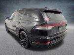 2026 Lincoln Aviator Reserve — Black Metallic exterior view 4, for sale at Lincoln of Bloomington in Bloomington, MN