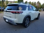 2024 Nissan Pathfinder Platinum — Pearl White exterior view 4, for sale at Downtown Nashville Nissan in Nashville, TN
