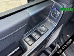 2023 Ford F-150 Lariat — Black Metallic interior and detail view 12, for sale at Green Ford in Greensboro, NC