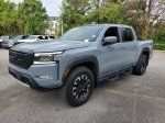 2024 Nissan Frontier PRO-4X — Boulder Gray exterior view 2, for sale at Downtown Nashville Nissan in Nashville, TN