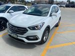 2018 Hyundai Santa Fe Sport 2.4 Base — Pearl White exterior view 2, for sale at McGrath Ford in Hiawatha, IA