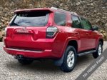 2015 Toyota 4Runner SR5 — Barcelona Red Metallic exterior view 2, for sale at A Better Way Wholesale Autos in Naugatuck, CT