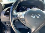 2017 INFINITI QX70 Base — Graphite Shadow interior and detail view 13, for sale at A Better Way Wholesale Autos in Naugatuck, CT