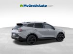 2026 Kia Sportage X-Pro Prestige — Gray exterior view 7, for sale at McGrath Ford in Hiawatha, IA