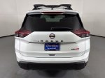 2026 Nissan Rogue Rock Creek — White Pearl exterior view 7, for sale at Courtesy Nissan of Mesa in Mesa, AZ