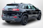 2018 Jeep Cherokee — Diamond Black Crystal Pearlcoat exterior view 5, for sale at Lakeside Automotive Group in Spring Lake, MI
