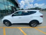 2018 Hyundai Santa Fe Sport 2.4 Base — Pearl White exterior view 4, for sale at McGrath Ford in Hiawatha, IA
