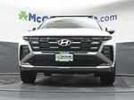 2025 Hyundai Tucson Hybrid SEL Convenience — White Pearl exterior view 7, for sale at McGrath Ford in Hiawatha, IA
