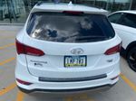 2018 Hyundai Santa Fe Sport 2.4 Base — Pearl White exterior view 5, for sale at McGrath Ford in Hiawatha, IA