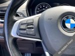 2019 BMW X2 sDrive28i — Black Sapphire Metallic interior and detail view 16, for sale at A Better Way Wholesale Autos in Naugatuck, CT