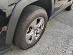 2024 Toyota RAV4 XLE — Midnight Black Metallic exterior view 8, for sale at Downtown Nashville Nissan in Nashville, TN