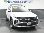 2025 Hyundai Tucson Hybrid SEL Convenience — White Pearl exterior view 5, for sale at McGrath Ford in Hiawatha, IA