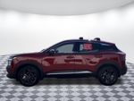 2025 Nissan Kicks SR — Scarlet exterior view 4, for sale at Bellingham Nissan in Bellingham, WA