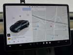 2024 Tesla Model Y - Stealth Gray exterior view 11
