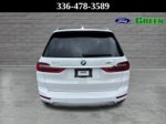 2021 BMW X7 xDrive40i — Alpine White exterior view 5, for sale at Green Ford in Greensboro, NC