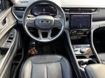 2021 Jeep GRAND CHEROKEE L Limited — Velvet Red Pearlcoat interior and detail view 18, for sale at Autostar CDJR of Hendersonville in Hendersonville, NC