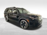 2026 Hyundai Santa Fe Hybrid SEL — Phantom Black exterior view 2, for sale at McGrath Ford in Hiawatha, IA
